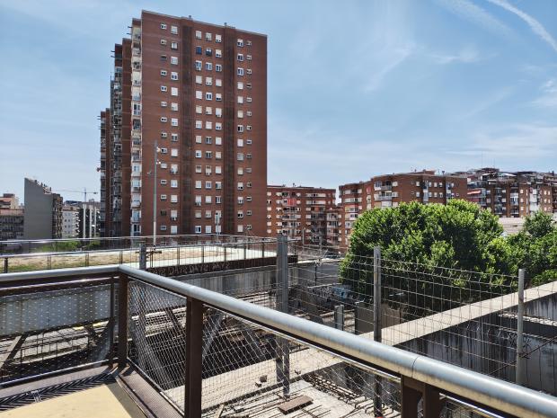 Photo of one end of the park overlooking the metro tracks