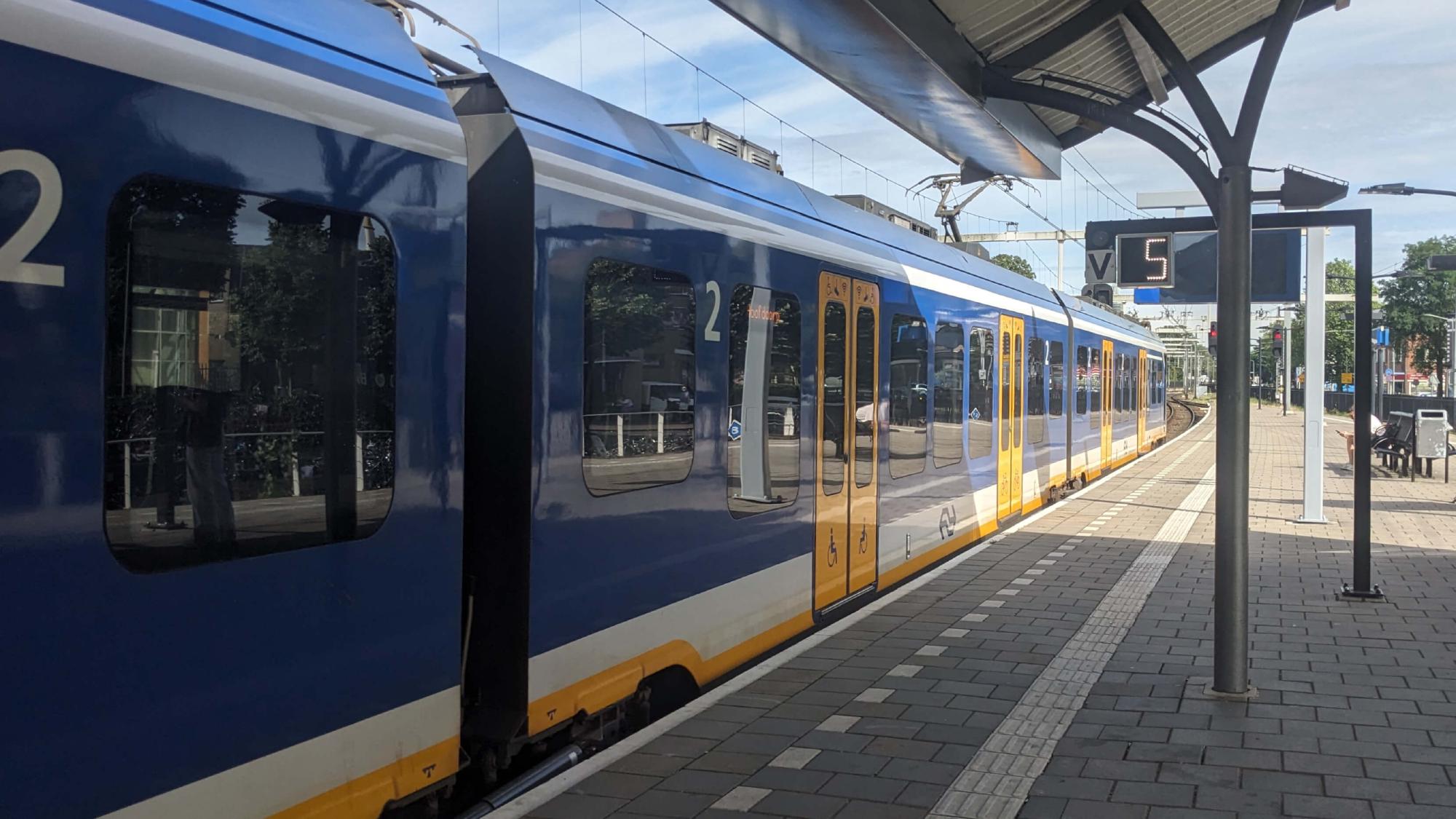 Train about to depart with a timer at the platform reading 5 seconds